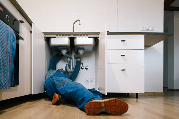 Professional Drain Cleaning technician working in Torrington, WY